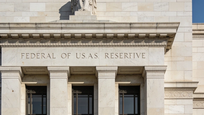 Fed Holds Interest Rates Steady but Signals Possible Future Hikes if Inflation Persists FinancialSumo