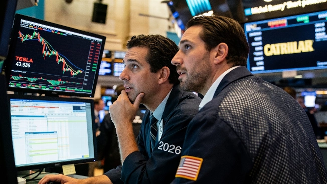 Michael Burry's Short Bets on Tesla and Caterpillar Gain Traction FinancialSumo